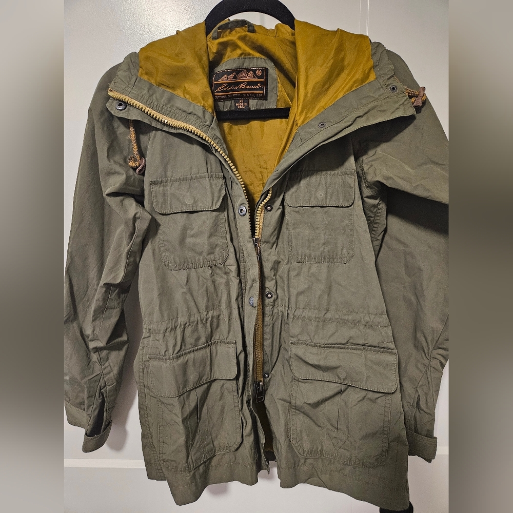 Vintage Eddie Bauer mountain parka in olive green with a mustard color lining